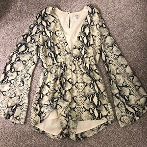 Snakeskin romper with bell sleeves